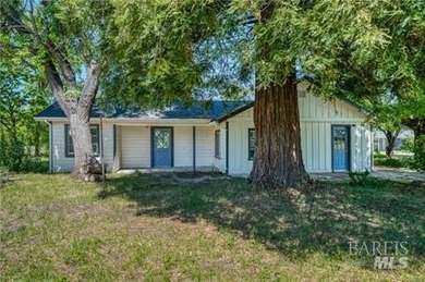 7.29-acre ranch featuring three distinct residential units. This - photo 1