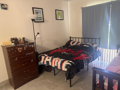 Bright first-floor 2/2 unit featuring ceramic tile, full - photo 7