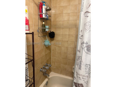 Bright first-floor 2/2 unit featuring ceramic tile, full - photo 8