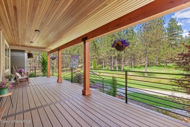 Set on a private, level 4.62-acre treed estate in desirable - photo 13