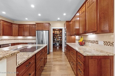 Set on a private, level 4.62-acre treed estate in desirable - photo 21