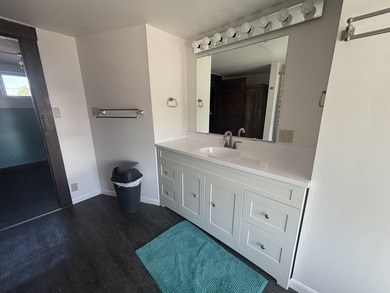 This four-bedroom home is situated across the street from open - photo 25
