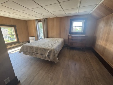 This four-bedroom home is situated across the street from open - photo 27