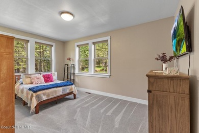 Set on a private, level 4.62-acre treed estate in desirable - photo 36