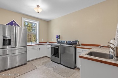 Set on a private, level 4.62-acre treed estate in desirable - photo 41