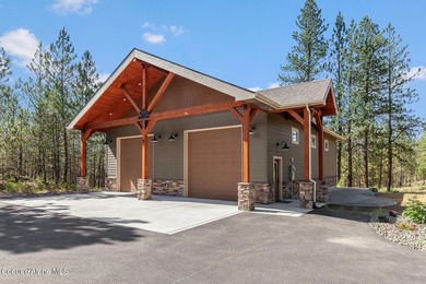 Set on a private, level 4.62-acre treed estate in desirable - photo 48
