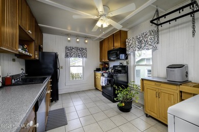 Positioned on a prominent corner lot in the heart of a charming - photo 4