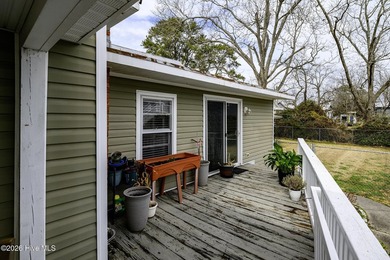 Positioned on a prominent corner lot in the heart of a charming - photo 5