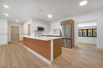 Welcome to this stunning 3-bedroom, 3-bathroom home tucked into - photo 9