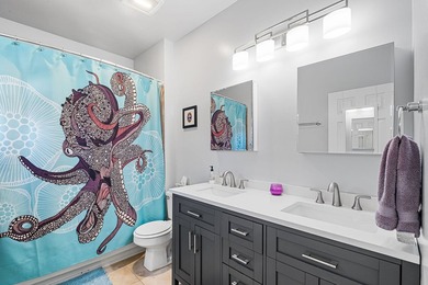 Beautifully updated duplex corner residence offering an - photo 20