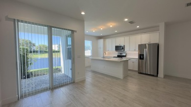 Stunning 2023 Toll Brothers townhouse in the gated community of - photo 3