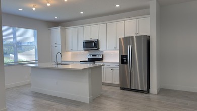 Stunning 2023 Toll Brothers townhouse in the gated community of - photo 5