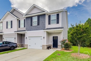 Welcome home to this beautiful 3-bedroom, 2.5-bath end-unit - photo 1