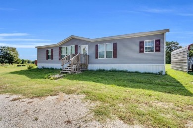 Discover the perfect blend of comfort and country living in this