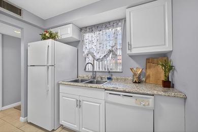 Welcome to this charming first-floor 1BR/1.5BA condo with - photo 11