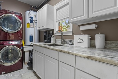 Stunning Bayou View Beauty with Custom Features & Entertainer's - photo 50