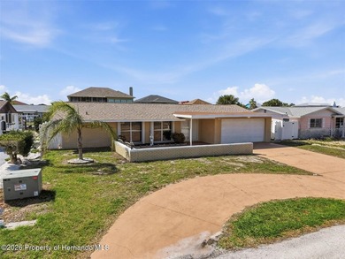 Welcome to your waterfront retreat in Hudson, Florida, just