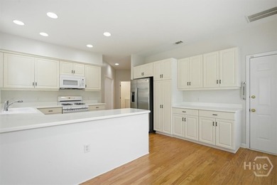 Tucked into a quiet, interior section of its community just off - photo 6