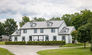 Spectacular equestrian estate nestled on 66 gorgeous acres on - photo 11