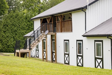 Spectacular equestrian estate nestled on 66 gorgeous acres on - photo 13