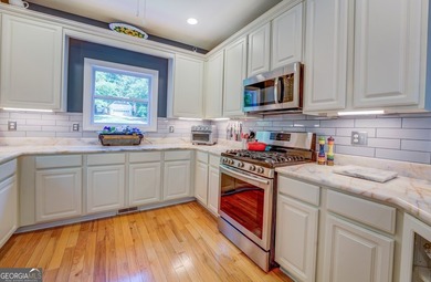 New Price on Custom Elevated Lakefront Home with Carriage House - photo 24