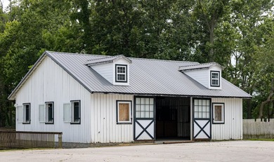 Spectacular equestrian estate nestled on 66 gorgeous acres on - photo 32