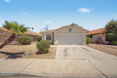 Welcome to this beautifully maintained home in the highly - photo 1