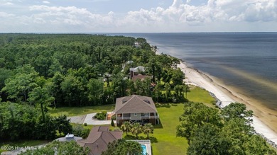 Spectacular beach house located on a 1.4 acre private piece of - photo 3