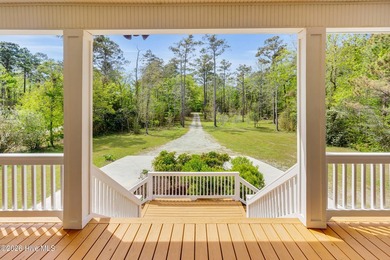 Spectacular beach house located on a 1.4 acre private piece of - photo 9