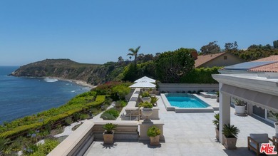Experience palatial elegance and abundant natural light in this - photo 1