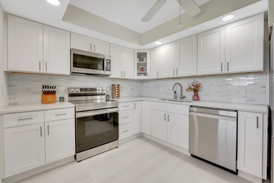 Experience elevated living in this stunning top-floor sanctuary