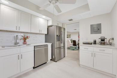 Experience elevated living in this stunning top-floor sanctuary