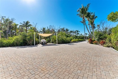 Welcome to 4150 Snail Island Court, a truly one-of-a-kind gated - photo 8