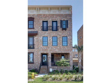 This spacious three-story townhouse offers 2,118 square feet of - photo 6