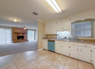 BRICK BEAUTY ON 0.5 ACRES! Welcome home to this charming - photo 12