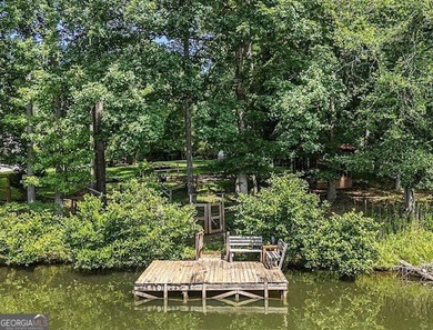 This sprawling lake estate featuring six bedrooms and five baths - photo 13