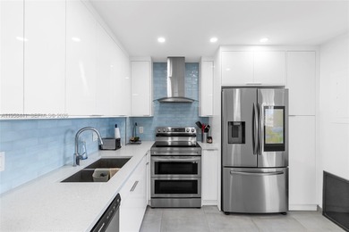 Live the ultimate beachfront lifestyle in this beautifully