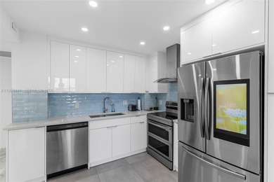 Live the ultimate beachfront lifestyle in this beautifully