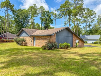 BRICK BEAUTY ON 0.5 ACRES! Welcome home to this charming - photo 48
