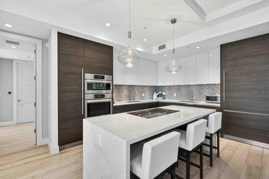 Step into the epitome of modern luxury with Unit 611 at Tower - photo 11