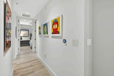 Step into the epitome of modern luxury with Unit 611 at Tower - photo 29