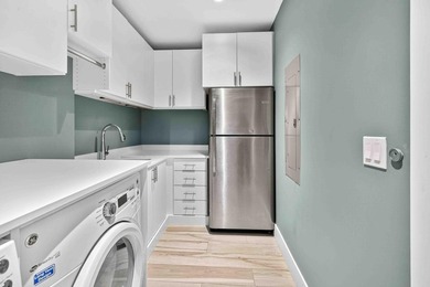 Step into the epitome of modern luxury with Unit 611 at Tower - photo 37