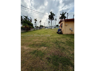 Welcome to this charming 3-bedroom, 1.5-bath home situated on an - photo 3