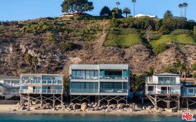Discover unparalleled coastal living in this beautifully updated - photo 1
