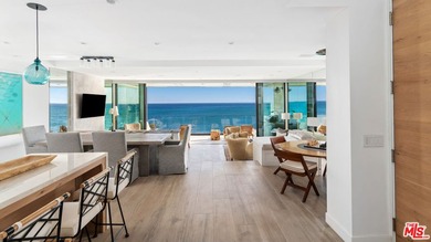Discover unparalleled coastal living in this beautifully updated - photo 2