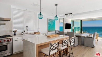 Discover unparalleled coastal living in this beautifully updated - photo 3