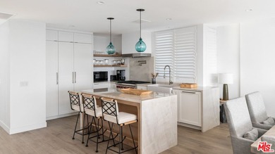Discover unparalleled coastal living in this beautifully updated - photo 4