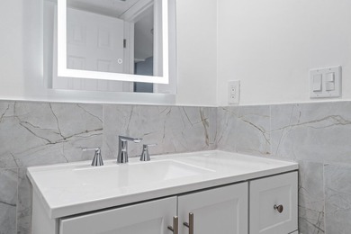 Every inch of this residence gleams from its meticulous top to - photo 26