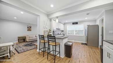 Welcome to this beautifully renovated 4-bedroom, 3-bathroom - photo 11