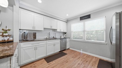 Welcome to this beautifully renovated 4-bedroom, 3-bathroom - photo 12